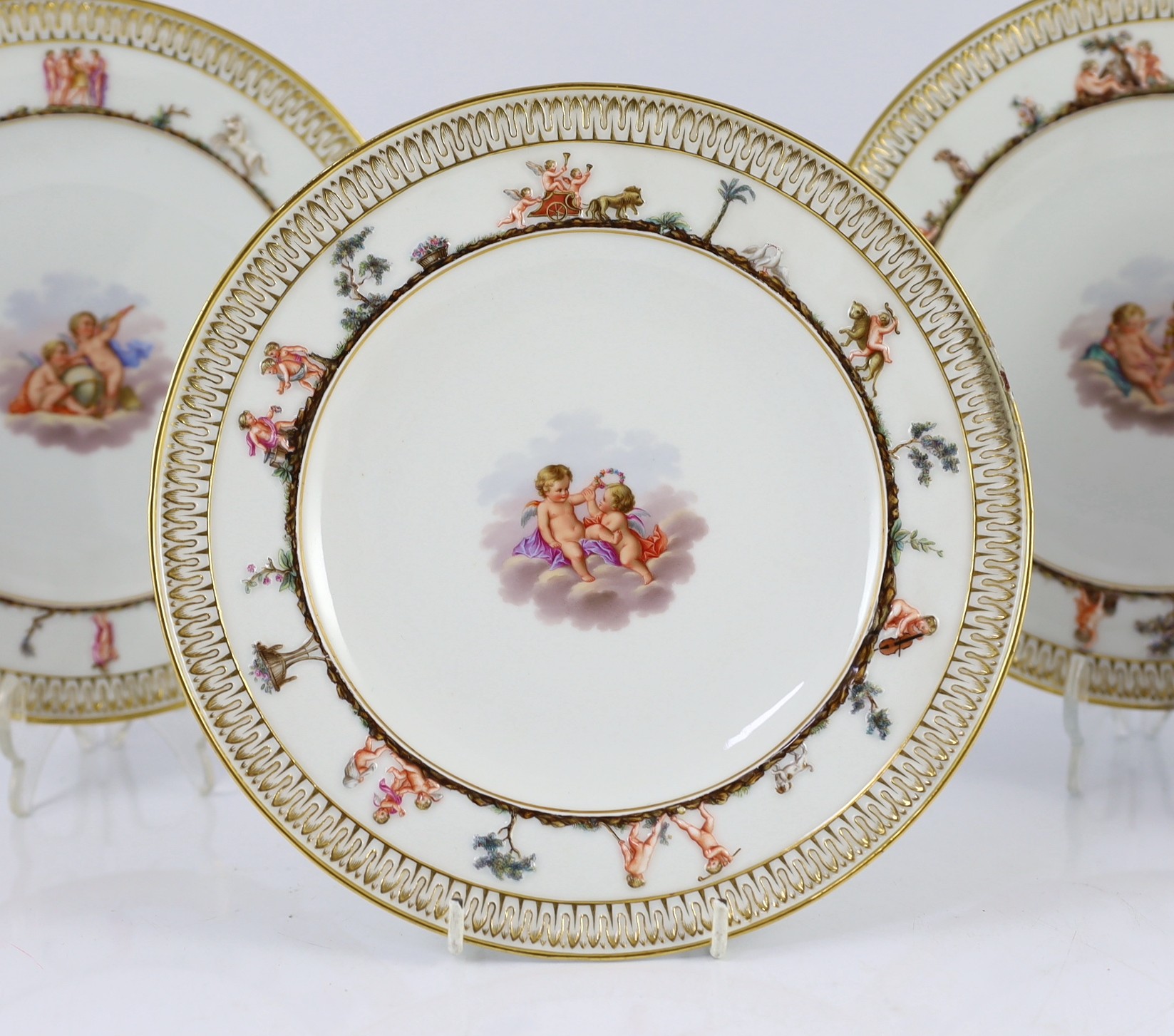 A set of five Meissen Capo di Monte style plates, 19th century, 22.7cm diameter, slight faults